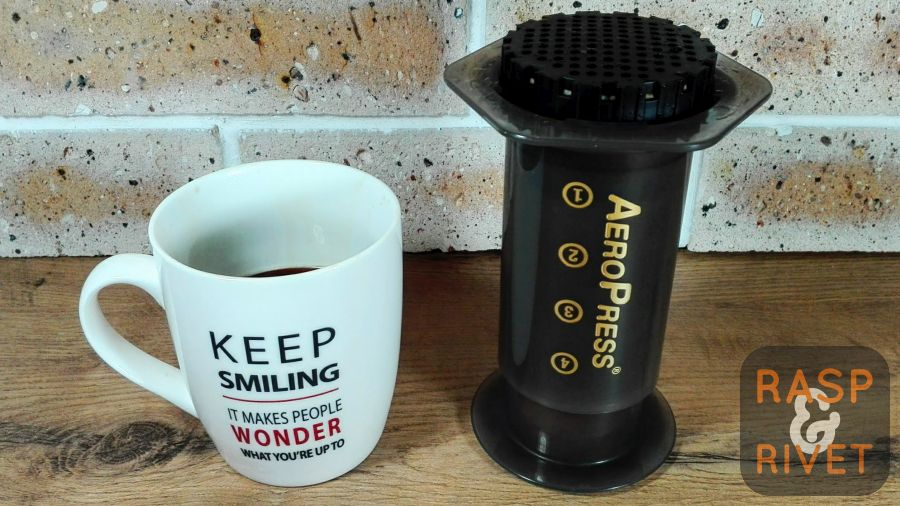 remove the aeropress from off the cup of coffee