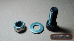 the 14mm cap screw with matching washer and lock nut, for attaching the angle grinder backing plate to the bosch