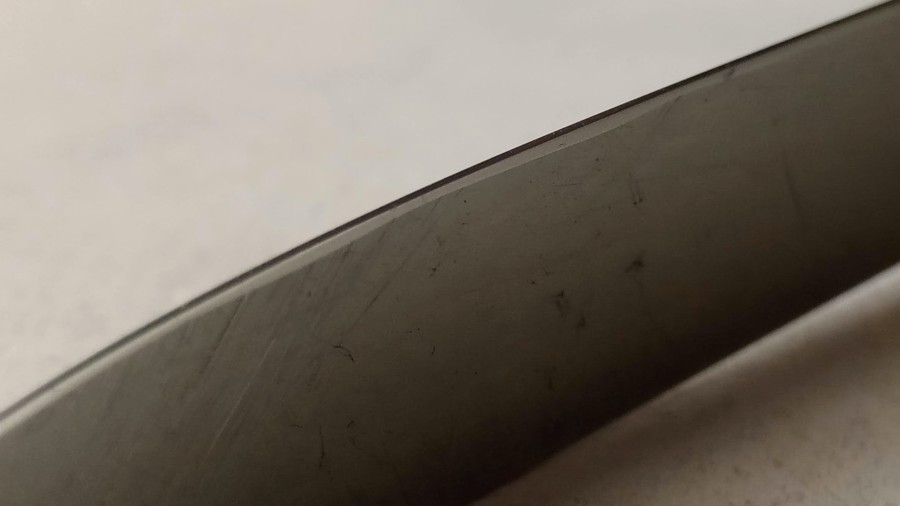 one side of the large blade of the victorinox, after sharpening