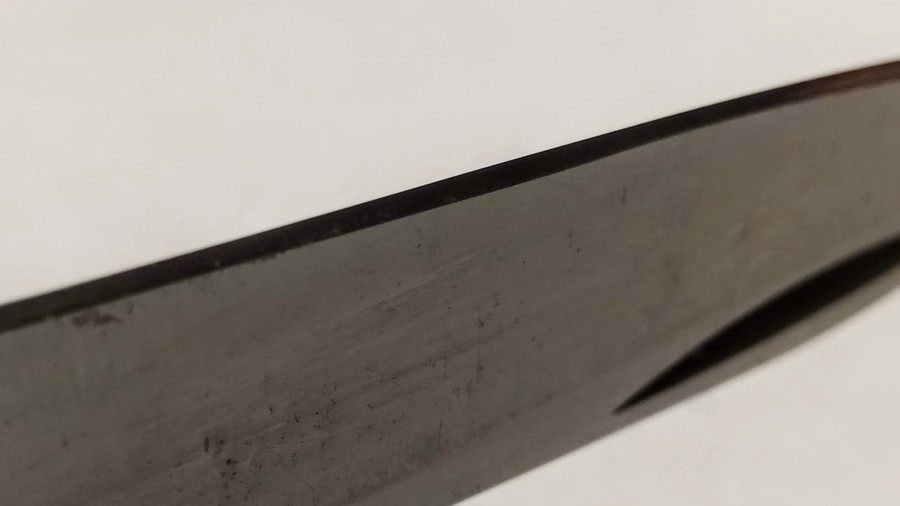 one side of the small blade of the victorinox, after sharpening