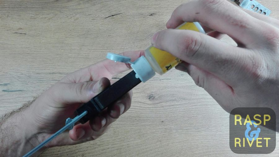 Add a few drops of oil to the honing stone. Add a few drops of oil to the honing stone.