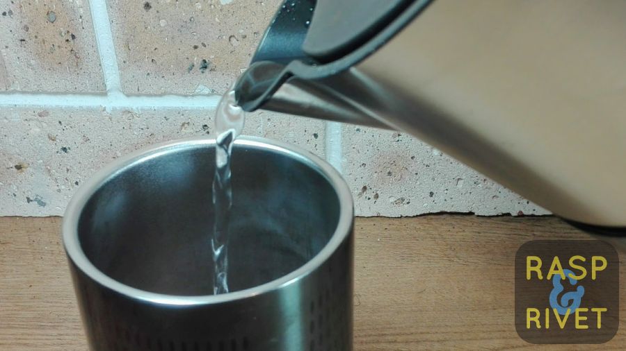 Add water to the tumbler. Add water to the tumbler.