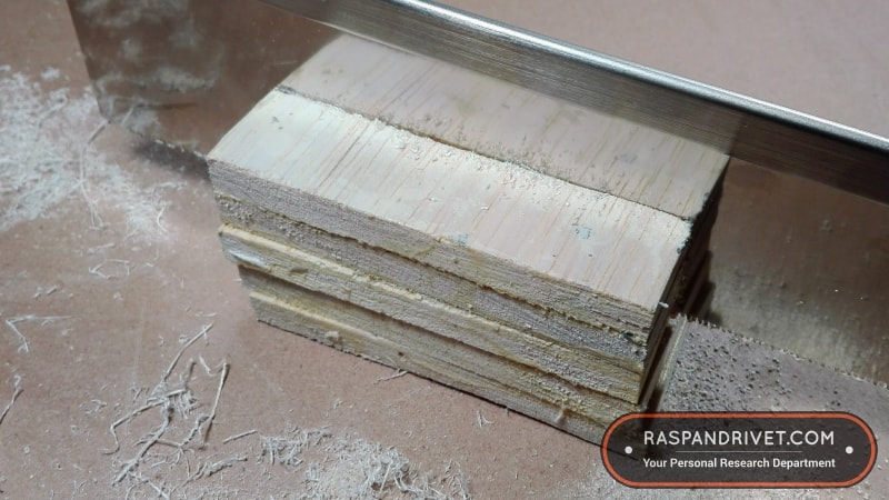 Halfway through the block of balsa wood with a cross cut using the dozuki. Halfway through the block of balsa wood with a cross cut using the dozuki.