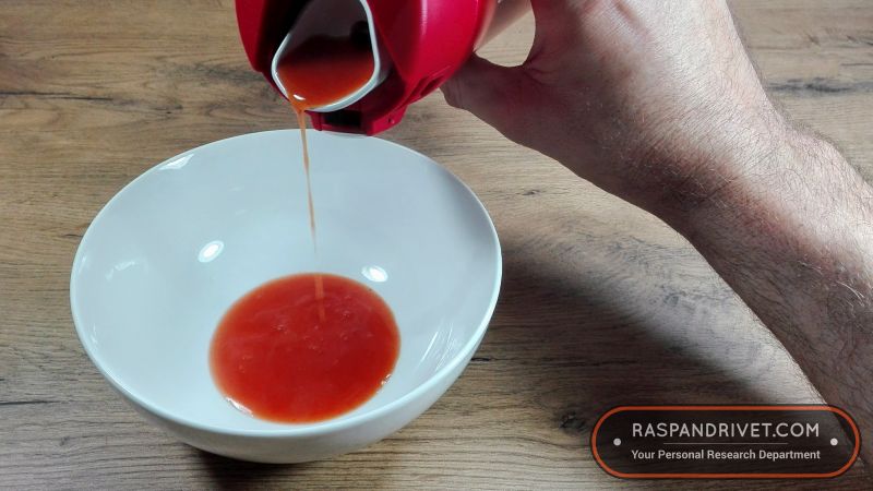 Me pouring tomato soup from the Zojirushi into a bowl. Me pouring tomato soup from the Zojirushi into a bowl.