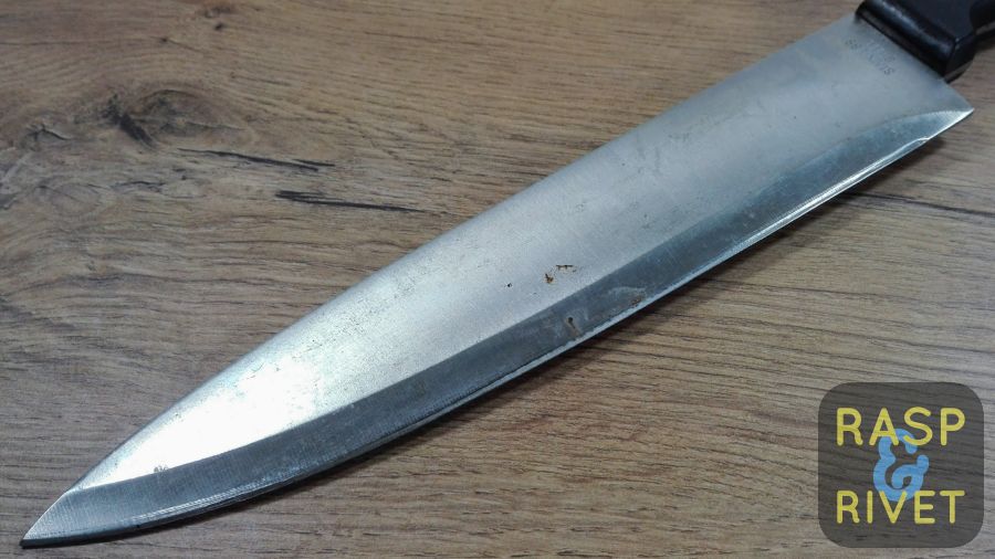 One side of the Chef’s knife before sharpening. One side of the Chef's knife before sharpening.