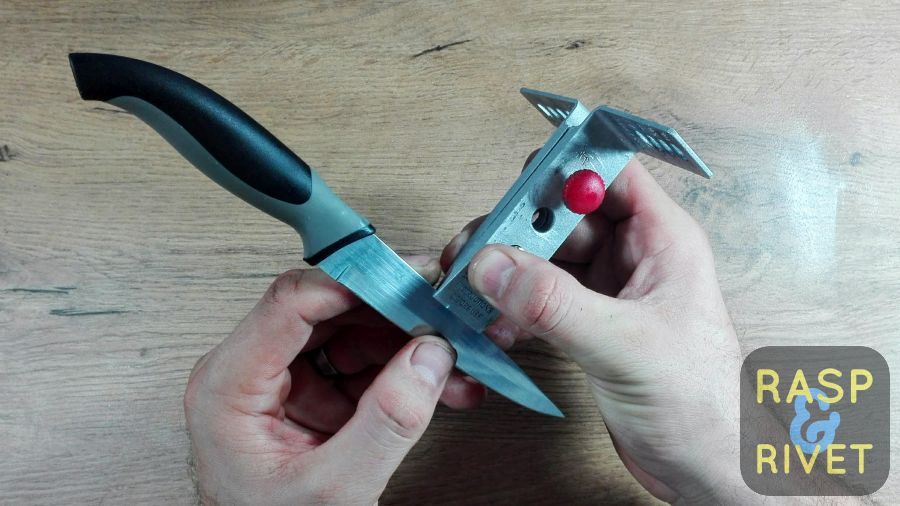 Secure the knife in the knife clamp slot. Secure the knife in the knife clamp slot.