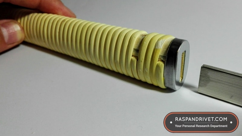 Slide the back and blade out of the handle. Slide the back and blade out of the handle.
