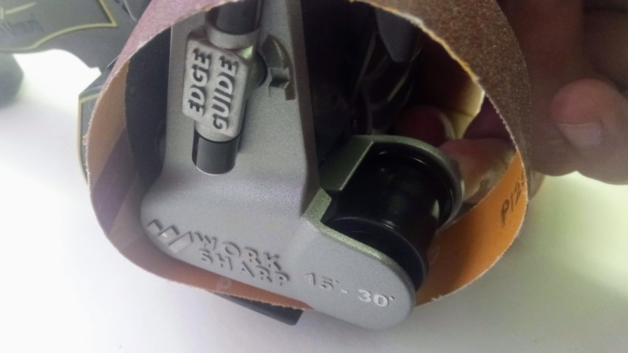 Slide the belt onto the two bottom pulleys. Slide the belt onto the two bottom pulleys.
