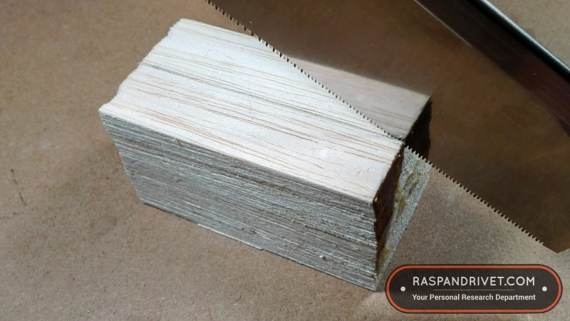Starting a rip cut on a block of balsa wood with the dozuki. Starting a rip cut on a block of balsa wood with the dozuki.