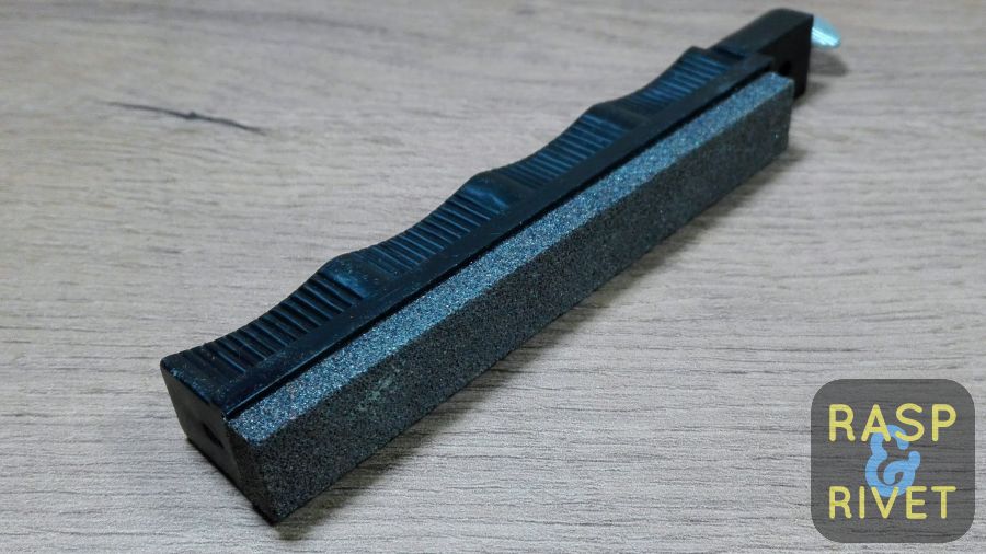 The black-handled 70 grit Lansky sharpening stone. The black-handled 70 grit Lansky sharpening stone.