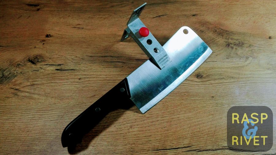 The meat cleaver clamped inside the Lansky. The meat cleaver clamped inside the Lansky.