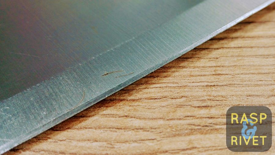 The meat cleaver’s other edge after sharpening with the Lansky. The meat cleaver's other edge after sharpening with the Lansky.