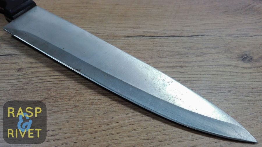 The other side of the Chef’s knife before sharpening. The other side of the Chef's knife before sharpening.