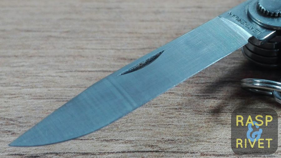 The other side of the Leatherman Micra’s blade after sharpening with the Lansky. The other side of the Leatherman Micra's blade after sharpening with the Lansky.