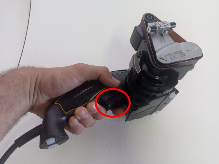 The power switch with variable speed knob sits underneath the handle. Press this to get the machine going. The power switch with variable speed knob sits underneath the handle. Press this to get the machine going.