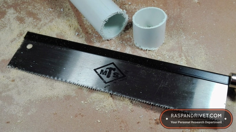 The standard backsaw did a terrible job of cutting the PVC pipe. The standard backsaw did a terrible job of cutting the PVC pipe.