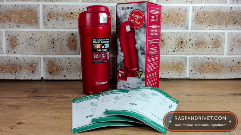 The Zojirushi travel mug along with usage pamphlets and the box it came in. The Zojirushi travel mug along with usage pamphlets and the box it came in.